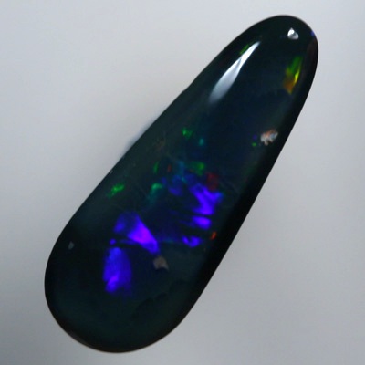 SOLID BLACK OPAL Red flashes together with green and blue